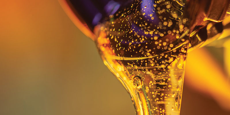 Close up of engine oil pouring